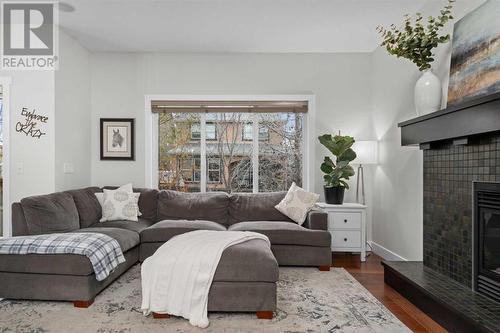 97 Mahogany Square Se, Calgary, AB - Indoor Photo Showing Living Room With Fireplace