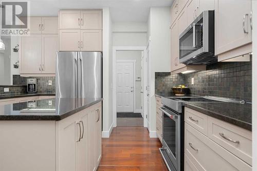 97 Mahogany Square Se, Calgary, AB - Indoor Photo Showing Kitchen With Upgraded Kitchen