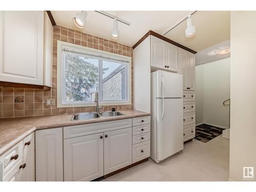 17404 76 Av Nw, Edmonton, AB - Indoor Photo Showing Kitchen With Double Sink