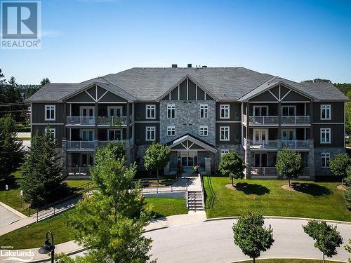 25 Beaver Street S Unit# 205, The Blue Mountains, ON - Outdoor With Balcony With Facade