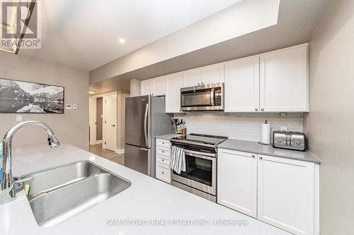 102 - 4 Tree Tops Lane, Huntsville, ON - Indoor Photo Showing Kitchen With Double Sink