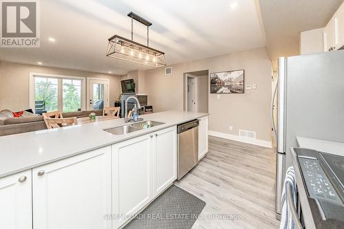 102 - 4 Tree Tops Lane, Huntsville, ON - Indoor Photo Showing Kitchen With Double Sink