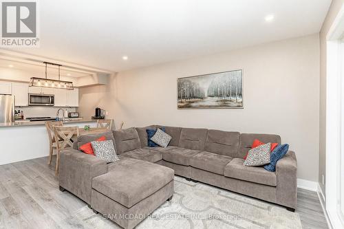 102 - 4 Tree Tops Lane, Huntsville, ON - Indoor Photo Showing Living Room