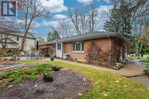 View of side of property with a patio area - 103 Mcgregor Crescent, Ancaster, ON - Outdoor