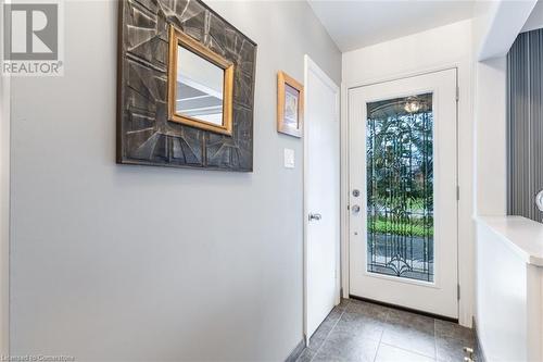 Doorway to outside with tile patterned flooring - 103 Mcgregor Crescent, Ancaster, ON - Indoor Photo Showing Other Room