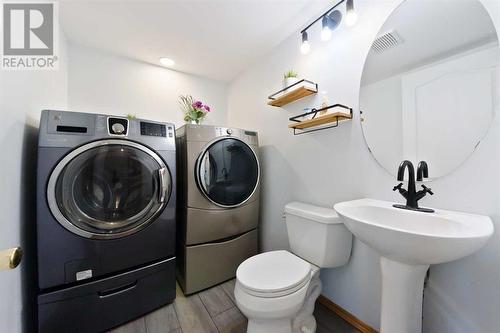 145 Macewan Park Rise Nw, Calgary, AB - Indoor Photo Showing Laundry Room