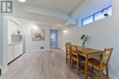 145 Macewan Park Rise Nw, Calgary, AB - Indoor Photo Showing Dining Room