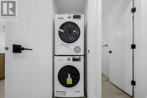 7915 Huntington Street Ne, Calgary, AB - Indoor Photo Showing Laundry Room