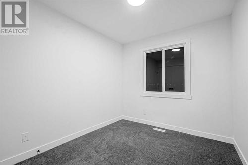 7915 Huntington Street Ne, Calgary, AB - Indoor Photo Showing Other Room