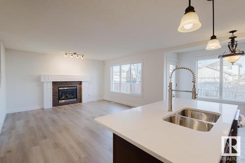 8017 Shaske Dr Nw, Edmonton, AB - Indoor With Fireplace