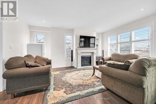 3 Aldgate Avenue, Hamilton, ON - Indoor Photo Showing Living Room With Fireplace