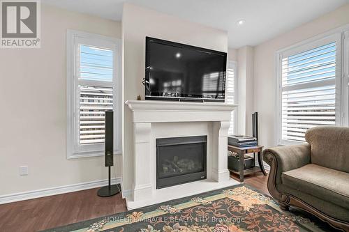 3 Aldgate Avenue, Hamilton, ON - Indoor Photo Showing Living Room With Fireplace