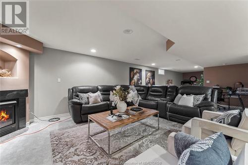 991 Woodland Crescent, Lakeshore, ON - Indoor Photo Showing Living Room With Fireplace