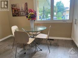 Dining Room with newer laminate flooring - 