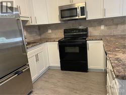 renovated white kitchen- nice counter space - 