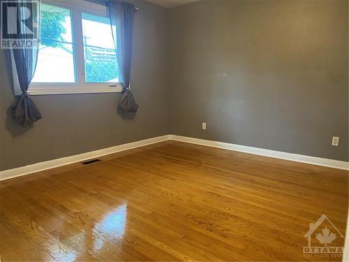 primary bedroom with hardwood flooring - 210 Harcourt Avenue, Ottawa, ON - Indoor Photo Showing Other Room