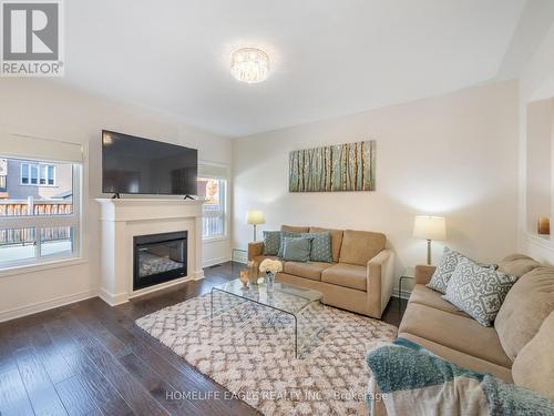 34 Brookview Drive, Bradford West Gwillimbury, ON - Indoor Photo Showing Living Room With Fireplace