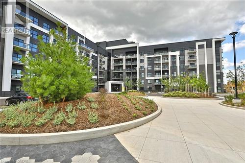 View of property - 128 Grovewood Common Unit# 117, Oakville, ON - Outdoor With Facade