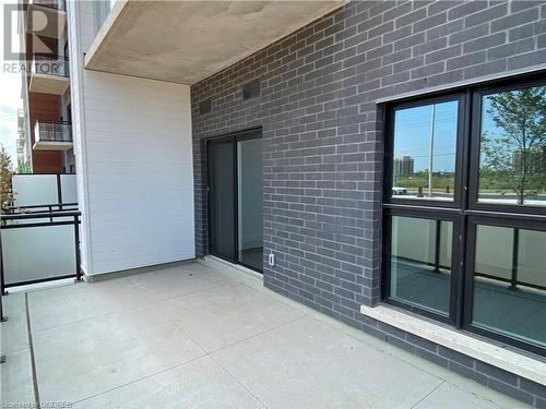 View of balcony - 128 Grovewood Common Unit# 117, Oakville, ON - Outdoor With Exterior