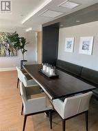 Dining area featuring light wood-type flooring - 