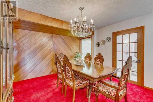 84 Range Way Nw, Calgary, AB - Indoor Photo Showing Dining Room