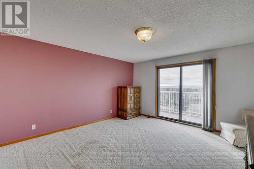 84 Range Way Nw, Calgary, AB - Indoor Photo Showing Other Room