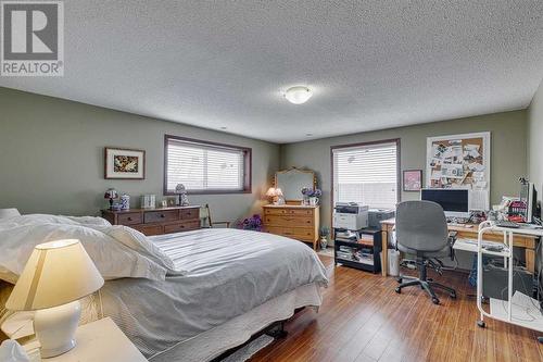 84 Range Way Nw, Calgary, AB - Indoor Photo Showing Bedroom