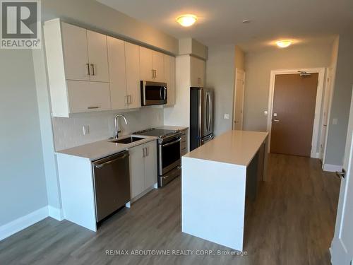 117 - 128 Grovewood Common, Oakville, ON - Indoor Photo Showing Kitchen With Stainless Steel Kitchen With Double Sink