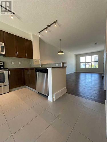 105 Sherwood Row Nw, Calgary, AB - Indoor Photo Showing Kitchen With Stainless Steel Kitchen