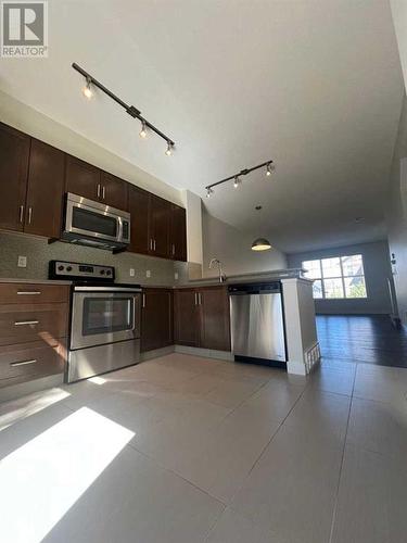 105 Sherwood Row Nw, Calgary, AB - Indoor Photo Showing Kitchen With Stainless Steel Kitchen