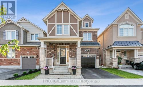 1308 Leger Way, Milton, ON - Outdoor With Facade