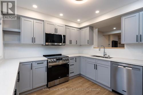 9 - 1010 Walden Circle, Mississauga, ON - Indoor Photo Showing Kitchen With Double Sink