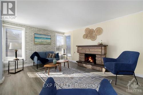 4551 Watsons Corners Road, Lanark Highlands, ON - Indoor Photo Showing Living Room With Fireplace