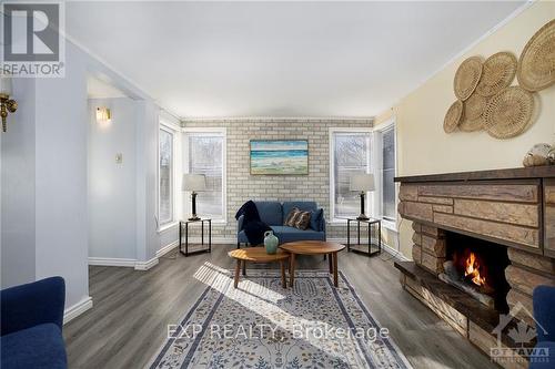 4551 Watsons Corners Road, Lanark Highlands, ON - Indoor Photo Showing Living Room With Fireplace