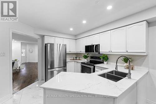 63 Weather Vane Lane, Brampton, ON - Indoor Photo Showing Kitchen With Double Sink With Upgraded Kitchen