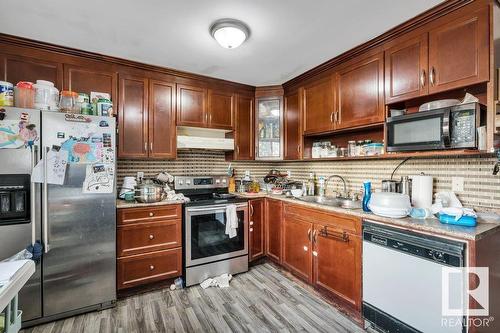 1244 Lakewood Rd W Nw, Edmonton, AB - Indoor Photo Showing Kitchen With Double Sink