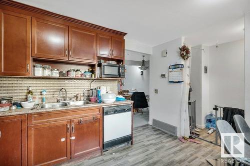 1244 Lakewood Rd W Nw, Edmonton, AB - Indoor Photo Showing Kitchen With Double Sink