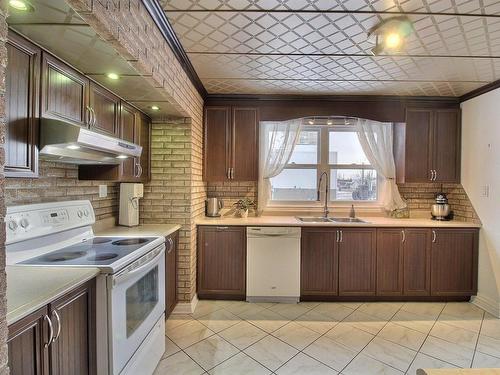 Cuisine - 1 1Re Avenue E., Rouyn-Noranda, QC - Indoor Photo Showing Kitchen With Double Sink