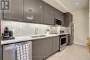 512 - 657 Cricklewood Drive, Mississauga, ON  - Indoor Photo Showing Kitchen With Double Sink With Upgraded Kitchen 