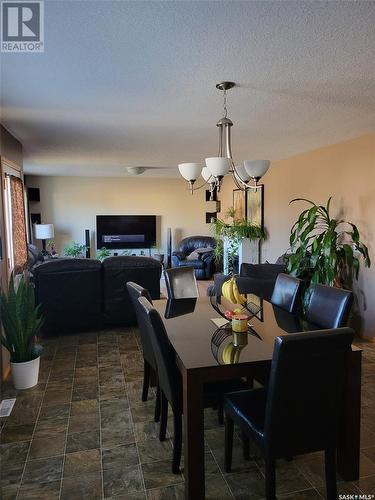 525 Carlyle Avenue, Carlyle, SK - Indoor Photo Showing Dining Room With Fireplace