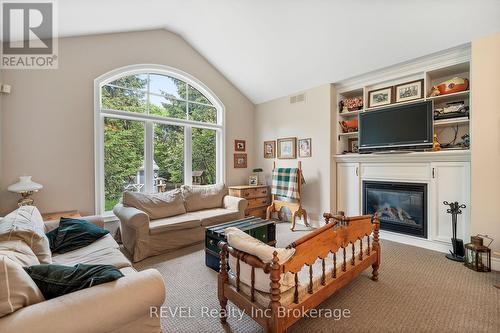 32 Sunrise Court, Fort Erie, ON - Indoor Photo Showing Living Room With Fireplace