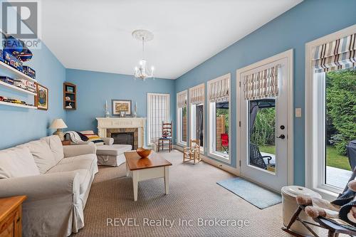 32 Sunrise Court, Fort Erie, ON - Indoor Photo Showing Living Room With Fireplace