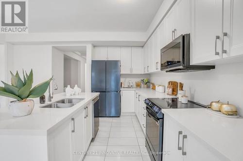 1309 Apollo Street, Oshawa, ON - Indoor Photo Showing Kitchen With Double Sink