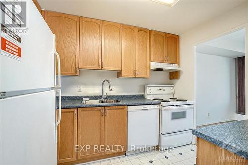 1102 - 265 Poulin Avenue, Britannia - Lincoln Heights And Area (6102 - Britannia), ON - Indoor Photo Showing Kitchen With Double Sink