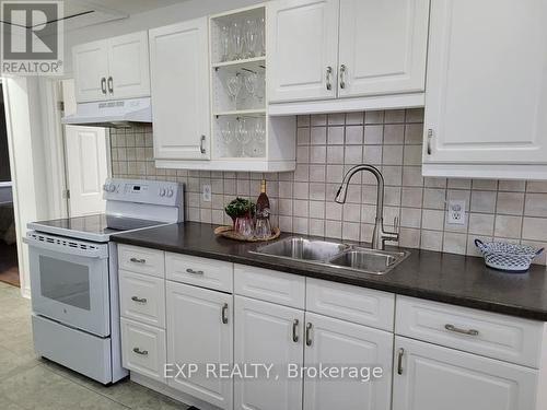 158 The Queensway S, Georgina, ON - Indoor Photo Showing Kitchen With Double Sink