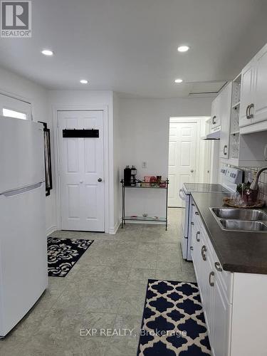 158 The Queensway S, Georgina, ON - Indoor Photo Showing Kitchen With Double Sink