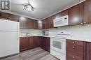 50 - 1016 Falgarwood Drive, Oakville, ON  - Indoor Photo Showing Kitchen With Double Sink 