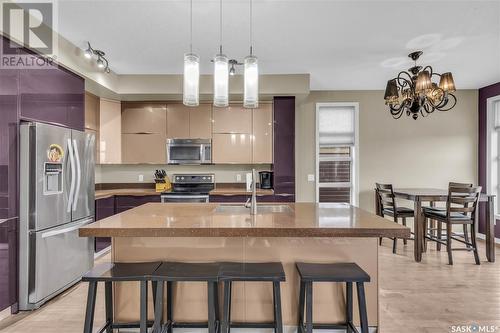 3250 37Th Street W, Saskatoon, SK - Indoor Photo Showing Kitchen With Stainless Steel Kitchen With Double Sink With Upgraded Kitchen