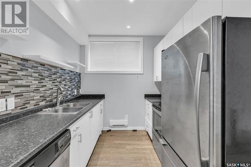 3250 37Th Street W, Saskatoon, SK - Indoor Photo Showing Kitchen With Double Sink