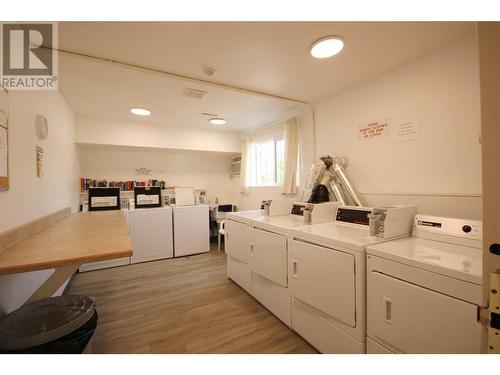 Shared Laundry - 150 Skaha Place Unit# 402, Penticton, BC - Indoor Photo Showing Laundry Room